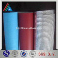 Heat absorbing film insulation material for buildings